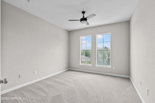 8290 Gate Pkwy Unit 1115, Jacksonville, FL 32216 - carpeted spare room featuring baseboards and a ceiling fan