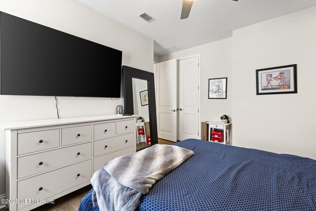 393 Ladyslipper Dr, Saint Johns, FL 32259 - bedroom featuring wood finished floors and a ceiling fan