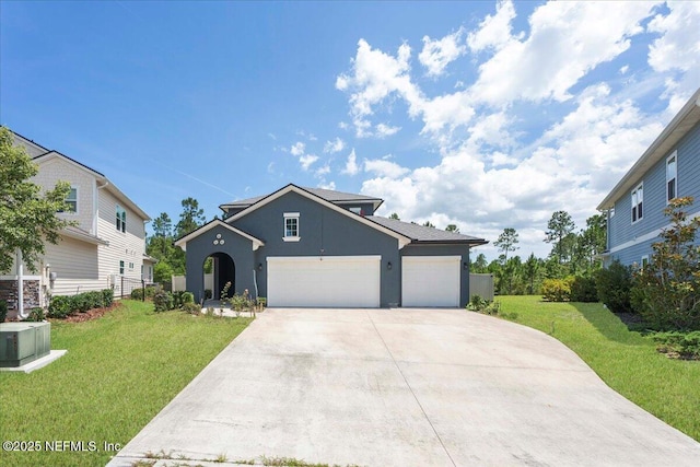 737 Windermere Way, Saint Augustine, FL 32095 - traditional-style house featuring stucco siding, a front lawn, driveway, and an attached garage