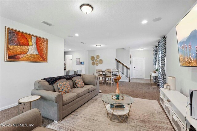 737 Windermere Way, Saint Augustine, FL 32095 - living room with carpet, stairway, and recessed lighting