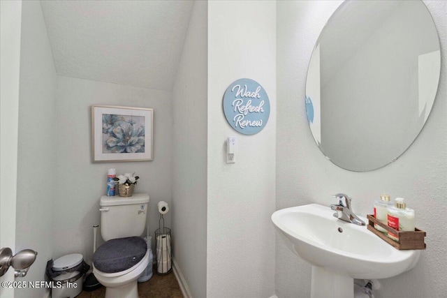 737 Windermere Way, Saint Augustine, FL 32095 - half bath with vaulted ceiling and tile patterned floors