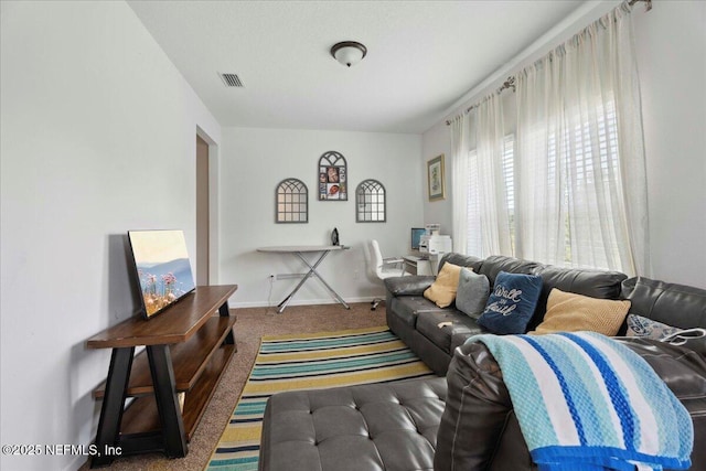 737 Windermere Way, Saint Augustine, FL 32095 - carpeted living room with baseboards