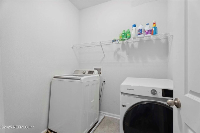 737 Windermere Way, Saint Augustine, FL 32095 - laundry room with washing machine and dryer and baseboards