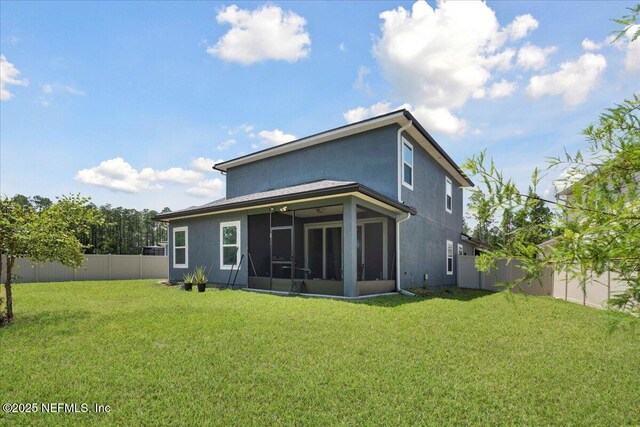 737 Windermere Way, Saint Augustine, FL 32095 - back of property with a fenced backyard and a sunroom
