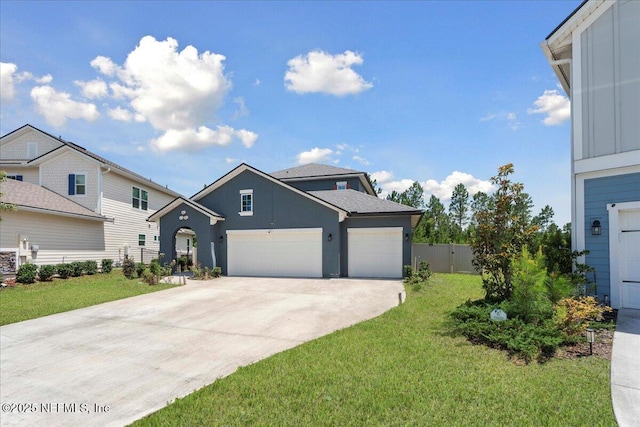 737 Windermere Way, Saint Augustine, FL 32095 - traditional home featuring an attached garage, concrete driveway, and stucco siding