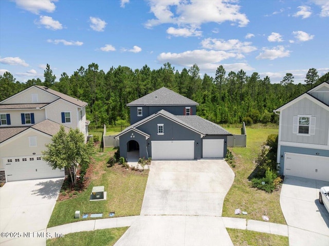 737 Windermere Way, Saint Augustine, FL 32095 - traditional-style home featuring concrete driveway, a view of trees, and a front yard