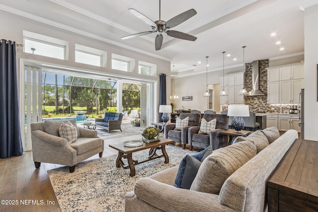95049 Wild Cherry Dr, Fernandina Beach, FL 32034 - living area with ornamental molding, ceiling fan, light wood-style floors, and recessed lighting
