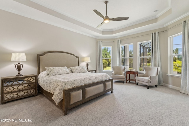 95049 Wild Cherry Dr, Fernandina Beach, FL 32034 - carpeted bedroom featuring ornamental molding, a raised ceiling, and a ceiling fan
