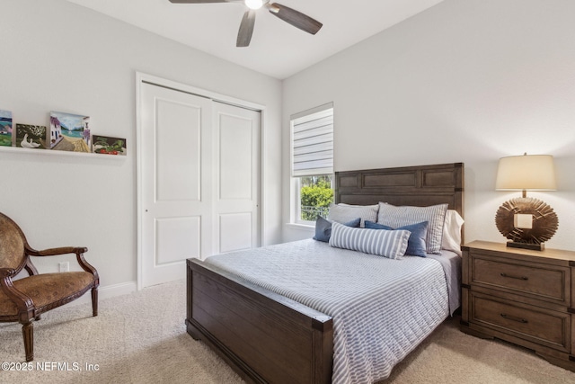 95049 Wild Cherry Dr, Fernandina Beach, FL 32034 - bedroom with light colored carpet, a closet, and ceiling fan