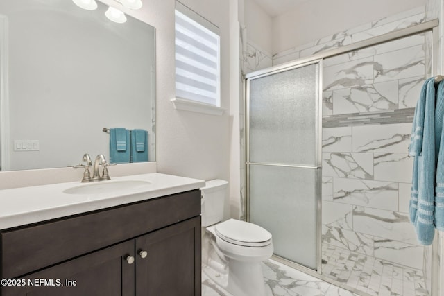 95049 Wild Cherry Dr, Fernandina Beach, FL 32034 - bathroom featuring marble finish flooring, a marble finish shower, and vanity