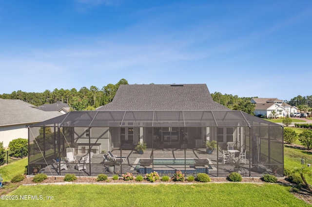 95049 Wild Cherry Dr, Fernandina Beach, FL 32034 - back of property featuring a patio, an outdoor pool, a lanai, and a yard