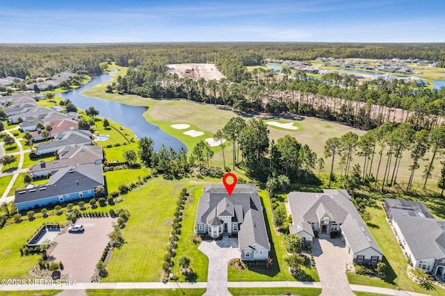 95049 Wild Cherry Dr, Fernandina Beach, FL 32034 - aerial view of residential area featuring a nearby body of water and a golf course