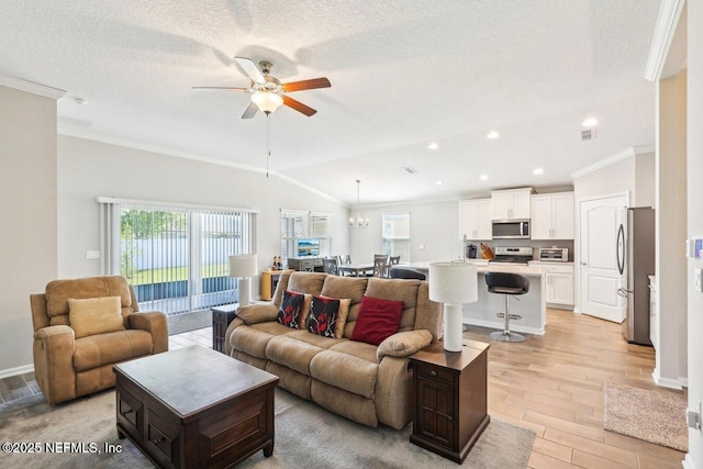 4032 Sandbank Ct, Middleburg, FL 32068 - living room featuring crown molding, ceiling fan, healthy amount of natural light, light wood-style floors, and a textured ceiling