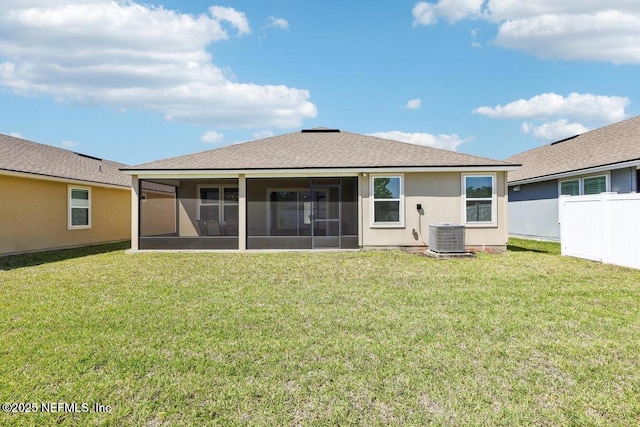 4032 Sandbank Ct, Middleburg, FL 32068 - rear view of house featuring a sunroom, stucco siding, and roof with shingles