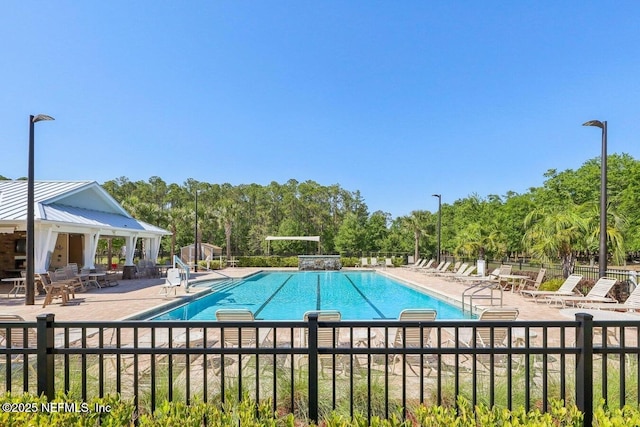 4032 Sandbank Ct, Middleburg, FL 32068 - community pool featuring a patio and view of scattered trees