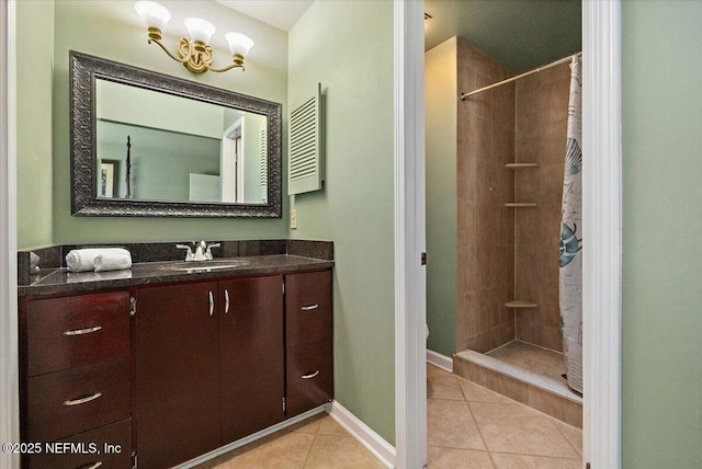 2715 Versailles Ct, Ponte Vedra Beach, FL 32082 - bathroom featuring vanity, tile patterned flooring, tiled shower, and a chandelier