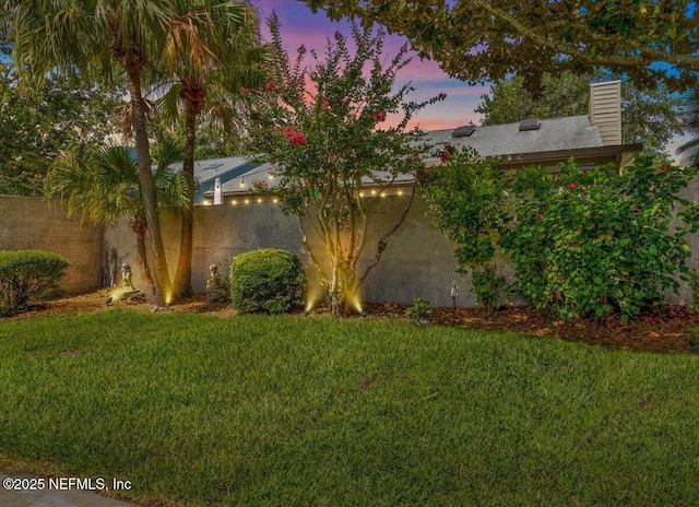 2715 Versailles Ct, Ponte Vedra Beach, FL 32082 - yard at dusk featuring a lawn