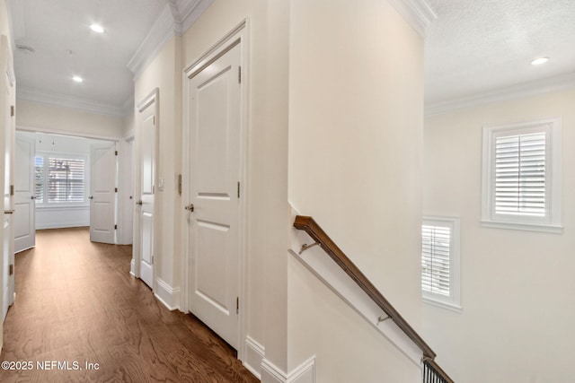 1387 Sunset View Ln, Jacksonville, FL 32207 - hall with wood finished floors, an upstairs landing, ornamental molding, and recessed lighting