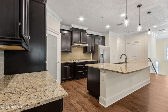 1387 Sunset View Ln, Jacksonville, FL 32207 - kitchen featuring stainless steel appliances, ornamental molding, dark wood-style flooring, decorative backsplash, and light stone countertops