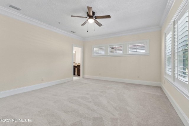 1387 Sunset View Ln, Jacksonville, FL 32207 - spare room featuring crown molding, a ceiling fan, light carpet, and a textured ceiling