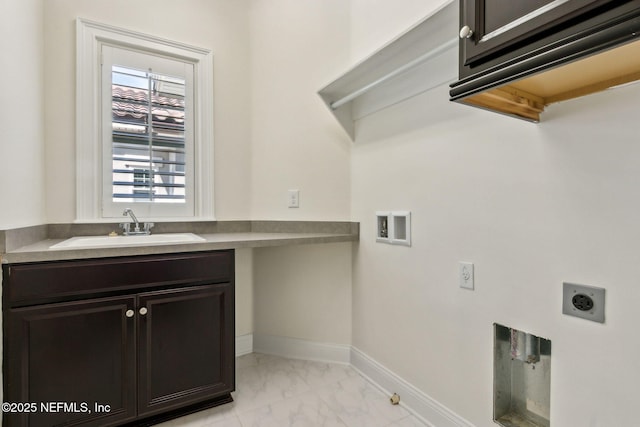1387 Sunset View Ln, Jacksonville, FL 32207 - laundry room with hookup for an electric dryer, light marble finish floors, washer hookup, cabinet space, and hookup for a gas dryer