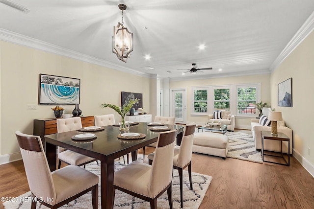 1387 Sunset View Ln, Jacksonville, FL 32207 - dining room with ornamental molding, light wood-type flooring, ceiling fan, a chandelier, and recessed lighting
