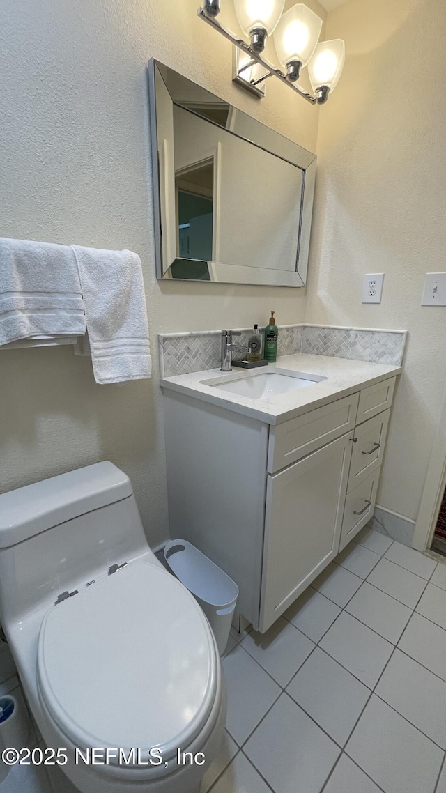 2708 SW 14th Dr Unit 220, Gainesville, FL 32608 - half bath with tile patterned floors and vanity