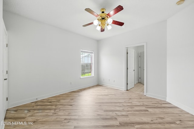 85712 Avant Rd, Yulee, FL 32097 - unfurnished bedroom with light wood-type flooring and a ceiling fan