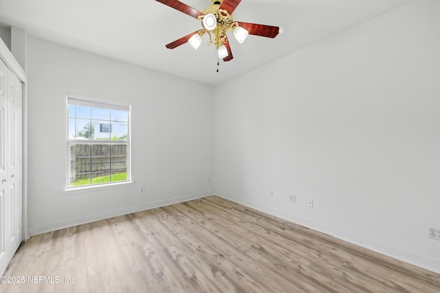 85712 Avant Rd, Yulee, FL 32097 - unfurnished bedroom with light wood-type flooring, a closet, and ceiling fan
