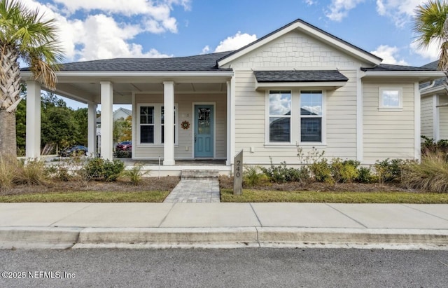 240 Julep St, Yulee, FL 32097 - bungalow-style house featuring a porch and roof with shingles