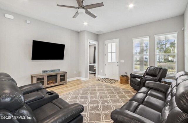 240 Julep St, Yulee, FL 32097 - living room featuring a ceiling fan, wood finished floors, and recessed lighting