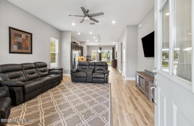 240 Julep St, Yulee, FL 32097 - living room with light wood-style flooring, a ceiling fan, and recessed lighting