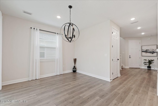 280 Cedar Elm Way, Saint Augustine, FL 32092 - unfurnished dining area with a chandelier, light wood-style flooring, and recessed lighting