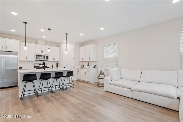 280 Cedar Elm Way, Saint Augustine, FL 32092 - living area with light wood-style flooring and recessed lighting