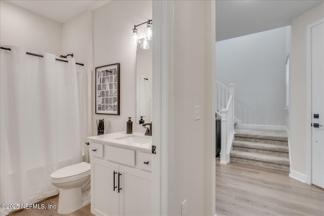 280 Cedar Elm Way, Saint Augustine, FL 32092 - full bathroom featuring vanity, shower / bath combo with shower curtain, and wood finished floors
