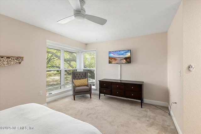 822 Coquina Bay, Ponte Vedra Beach, FL 32082 - bedroom with light colored carpet, ceiling fan, a textured wall, and a textured ceiling
