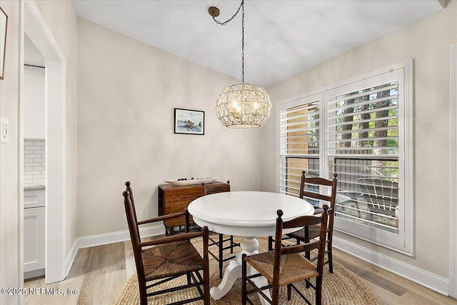 822 Coquina Bay, Ponte Vedra Beach, FL 32082 - dining area featuring light wood finished floors and a chandelier