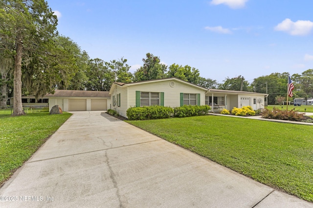 270 Drew St W, Baldwin, FL 32234 - ranch-style home with a front lawn, a garage, and covered porch