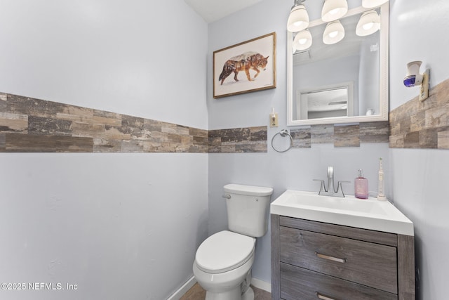 270 Drew St W, Baldwin, FL 32234 - half bathroom with vanity and a wainscoted wall