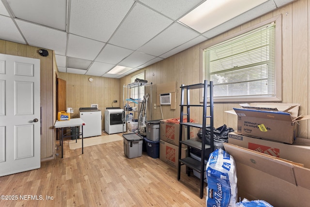 270 Drew St W, Baldwin, FL 32234 - office area with wooden walls, wood finished floors, washing machine and clothes dryer, a paneled ceiling, and a wall mounted AC