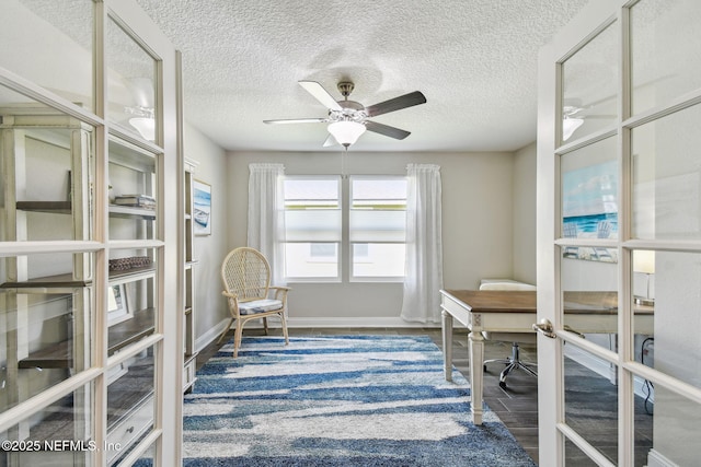 100 Dove Tree Ln, Saint Augustine, FL 32095 - office area featuring a ceiling fan, a textured ceiling, and wood finished floors