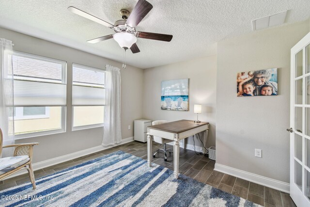 100 Dove Tree Ln, Saint Augustine, FL 32095 - home office with wood tiled floors, a textured ceiling, and a ceiling fan