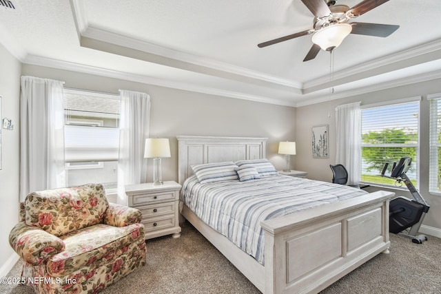 100 Dove Tree Ln, Saint Augustine, FL 32095 - carpeted bedroom featuring a raised ceiling, ornamental molding, and a ceiling fan