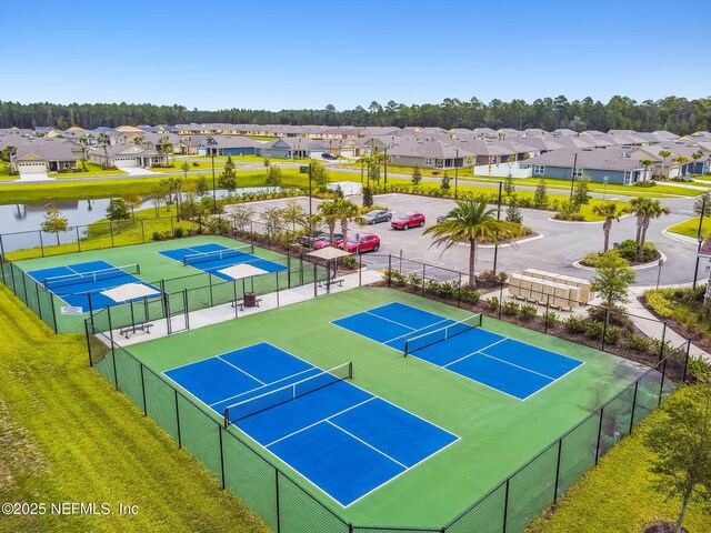 100 Dove Tree Ln, Saint Augustine, FL 32095 - view of tennis court with a residential view and a water view