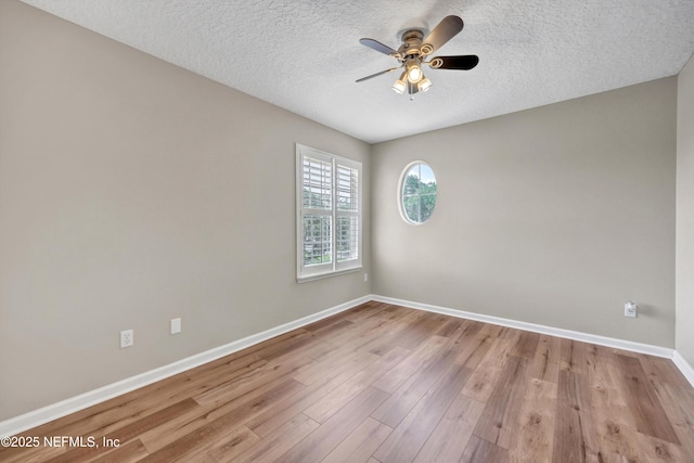 168 Pinehurst Pointe Dr, Saint Augustine, FL 32092 - spare room featuring ceiling fan, wood finished floors, and a textured ceiling