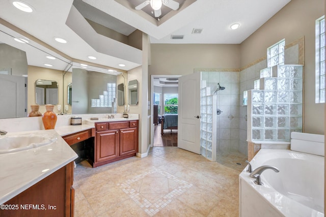 168 Pinehurst Pointe Dr, Saint Augustine, FL 32092 - full bath featuring vanity, a bath, a walk in shower, a ceiling fan, and recessed lighting