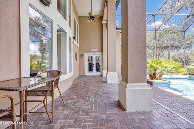 168 Pinehurst Pointe Dr, Saint Augustine, FL 32092 - view of patio with french doors, a ceiling fan, an outdoor pool, and glass enclosure