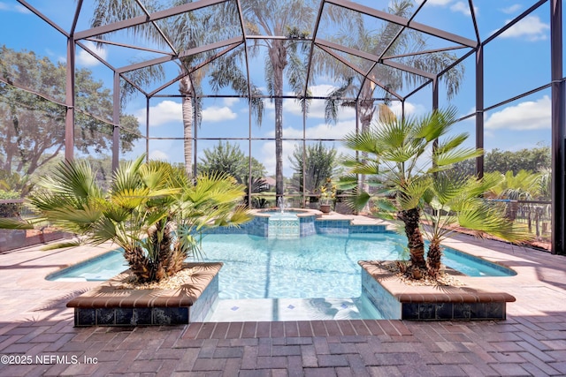 168 Pinehurst Pointe Dr, Saint Augustine, FL 32092 - view of pool featuring a pool with connected hot tub, glass enclosure, and a patio area