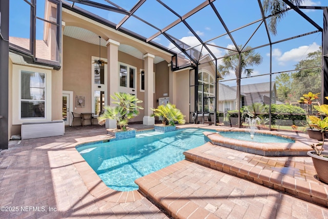 168 Pinehurst Pointe Dr, Saint Augustine, FL 32092 - view of pool with a patio area, glass enclosure, and a pool with connected hot tub