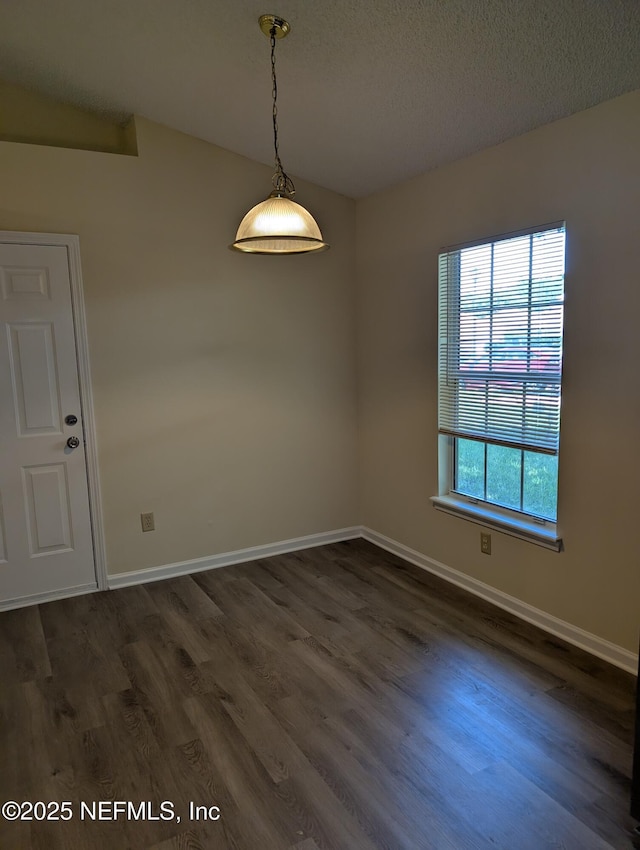 9302 Cumberland Station Dr, Jacksonville, FL 32257 - unfurnished room featuring dark wood-style floors and a textured ceiling